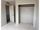 This is a bedroom with a closet and a door at 317 Whimsical Ave, Brighton, CO 80603