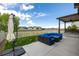 Backyard features a blue outdoor seating set at 10595 Boston St, Commerce City, CO 80640