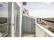 Balcony featuring wooden floors with views of the community at 2862 S Galapago Ct, Englewood, CO 80110