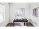 Office space featuring a window for natural light, carpeted floor, and a modern style desk at 2862 S Galapago Ct, Englewood, CO 80110