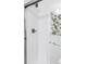 Close-up of bathroom shower with elegant tile design and modern fixtures at 2862 S Galapago Ct, Englewood, CO 80110
