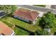 Aerial view of home with fenced backyard and partially covered back porch area at 12017 W 58Th Pl, Arvada, CO 80004