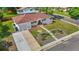 Charming single-story home with well-maintained landscaping and a cozy, inviting front entrance at 12017 W 58Th Pl, Arvada, CO 80004