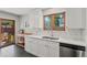Bright kitchen with stainless steel appliances and ample countertop space at 12017 W 58Th Pl, Arvada, CO 80004
