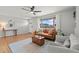 Cozy living room with large windows and stylish furniture at 12017 W 58Th Pl, Arvada, CO 80004