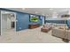 Inviting living room featuring a comfortable sectional and a mounted television at 12017 W 58Th Pl, Arvada, CO 80004