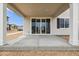 Covered patio featuring a sliding glass door, offering a seamless indoor-outdoor living experience at 6636 N Nepal St, Aurora, CO 80019