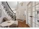 Bright foyer with hardwood floors, two story ceiling and elegant decor and furniture at 11513 Greenbriar Ln, Parker, CO 80138
