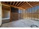 Covered patio with wooden lattice sides and concrete flooring at 10942 W 107Th Pl, Broomfield, CO 80021