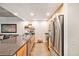 Kitchen featuring stainless steel appliances and granite countertops at 275 S Harrison St # 210, Denver, CO 80209