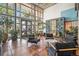 Bright and airy lobby with large windows, comfortable seating, and decorative plants creating a welcoming atmosphere at 275 S Harrison St # 210, Denver, CO 80209