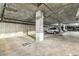 Spacious parking garage with marked spaces and ample lighting, providing convenient and secure parking for residents at 275 S Harrison St # 210, Denver, CO 80209