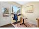 Inviting entryway featuring a coat rack, table, and a window with a view of the outdoors at 1333 Mariposa Ave, Boulder, CO 80302