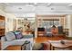 Inviting living room with hardwood floors, exposed beams, cozy seating, and views to the backyard at 1333 Mariposa Ave, Boulder, CO 80302