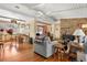 Cozy living room featuring a stone fireplace, hardwood floors, and comfortable seating at 1333 Mariposa Ave, Boulder, CO 80302