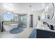 Luxurious bathroom with a soaking tub, separate shower, double vanity, and modern finishes at 941 Saint Andrews Ln, Louisville, CO 80027