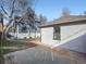 View of backyard, showing detached garage and studio at 2824 Cherry St, Denver, CO 80207