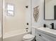 Clean bathroom with white subway tiles and modern fixtures at 2824 Cherry St, Denver, CO 80207