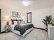 Main bedroom with plush carpet and an en-suite bathroom at 2824 Cherry St, Denver, CO 80207