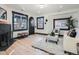 Bright living room with hardwood floors, fireplace and comfortable seating at 2824 Cherry St, Denver, CO 80207