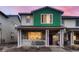 Charming two-story home with a welcoming front porch and colorful exterior at 21538 E 59Th Pl, Aurora, CO 80019