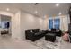 Comfortable living room with a plush rug and neutral color palette at 21538 E 59Th Pl, Aurora, CO 80019