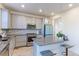 Well-designed kitchen featuring granite countertops, stainless steel appliances, and a stylish breakfast bar at 9448 Richfield St, Commerce City, CO 80022