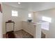 Bright loft area with carpet and natural light, perfect for a home office or play area at 9448 Richfield St, Commerce City, CO 80022