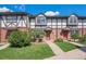 Charming townhome exterior with well-maintained lawn and landscaping at 3855 S Monaco St # 182, Denver, CO 80237