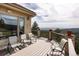 Expansive deck offering views of the surrounding landscape with ample seating for relaxation at 1426 Rembrandt Rd, Boulder, CO 80302