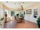 Cozy dining area with large windows showcasing the scenic views, perfect for Gathering meals at 1426 Rembrandt Rd, Boulder, CO 80302