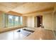 Bright exercise room featuring hardwood floors, scenic view and comfortable space for physical activity at 1426 Rembrandt Rd, Boulder, CO 80302