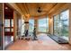 Sunroom that has been converted to an exercise room with panoramic views at 1426 Rembrandt Rd, Boulder, CO 80302
