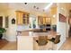 Bright eat-in kitchen with updated appliances, a breakfast bar, and custom cabinetry at 1426 Rembrandt Rd, Boulder, CO 80302