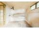 Unique shower area with artistic plaster walls and stone flooring at 1426 Rembrandt Rd, Boulder, CO 80302