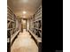Rustic wine cellar boasting extensive wooden racks and built in benches for storage and organization at 1426 Rembrandt Rd, Boulder, CO 80302