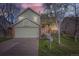 Charming home with a well-maintained front yard and a two-car garage at 12036 Monaco Dr, Brighton, CO 80602