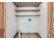 Utility closet with shelving at 12036 Monaco Dr, Brighton, CO 80602