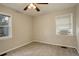 Bright bedroom with ceiling fan and window coverings at 3052 S Grape Way, Denver, CO 80222