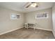 Spacious bedroom with neutral decor and ceiling fan at 3052 S Grape Way, Denver, CO 80222