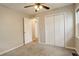 Spacious bedroom with double door closet and ceiling fan at 3052 S Grape Way, Denver, CO 80222