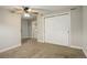 Bedroom with double door closet and carpet flooring at 3052 S Grape Way, Denver, CO 80222