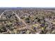 An aerial view of a neighborhood with tree-lined streets and well-maintained homes at 860 Magnolia St, Denver, CO 80220