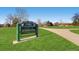 View of a park including a sign that reads Kittredge Park and green grass at 860 Magnolia St, Denver, CO 80220