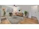 Bright living room with hardwood floors, large windows, and stylish decor with ample natural light at 860 Magnolia St, Denver, CO 80220