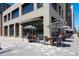 Outdoor patio seating at Frank & Roze with stylish umbrellas, comfortable chairs, and a vibrant atmosphere at 860 Magnolia St, Denver, CO 80220