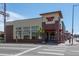 Exterior of a Trader Joe's retail store featuring large windows, a brick facade, and a well-maintained entrance at 860 Magnolia St, Denver, CO 80220