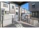 Balcony overlooking the modern exterior of the townhome complex at 2032 S Holly St # 3, Denver, CO 80222