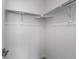 Well-organized closet with rod and shelf, ready for efficient storage solutions at 2032 S Holly St # 3, Denver, CO 80222