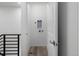 Hallway features a convenient laundry hook up, and durable wood-look flooring at 2032 S Holly St # 3, Denver, CO 80222